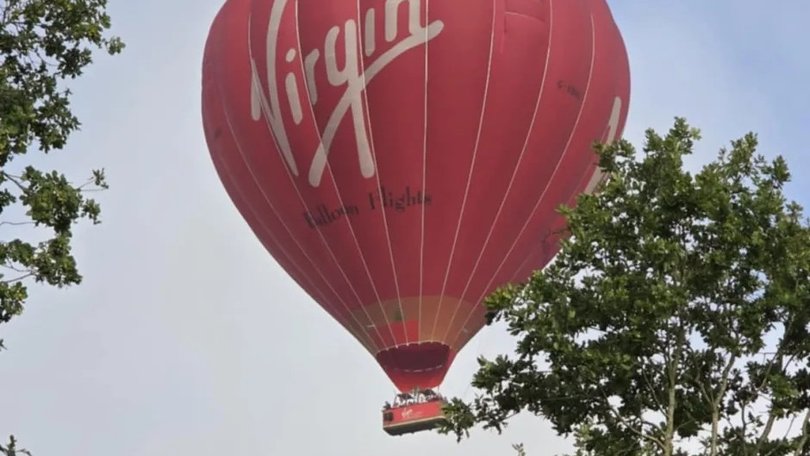A man jumped from the basket of the hot air balloon. 