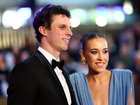 Max Holmes of the Cats and Jess Butler are seen arriving.