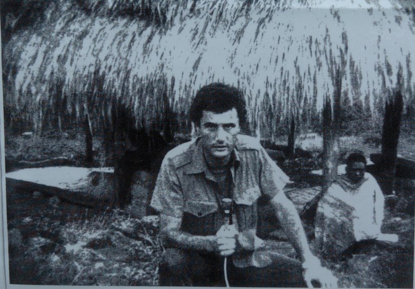 Copy photograph of Greg Shackleton posted on a wall outside the New South Wales Coroners Court.