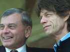Umpire Dickie Bird, seen with cricket lover Mick Jagger, has died at 92. (AP PHOTO)