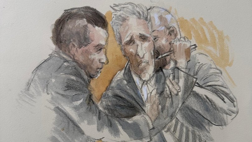 This courtroom sketch shows Ryan Routh trying to stab himself in the neck with a pen.