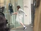 An unidentified woman breaks into a Ji Studio clothing store on Elizabeth St in Melbourne on Saturday. On Wednesday a police spokesperson said they had no information on the case.
