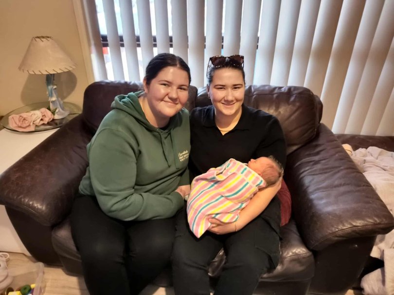 Tara Winston and her fiancee Rhiannon with baby Ryan.