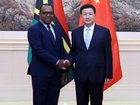 Chinese State Councilor and Minister of Public Security Wang Xiaohong meets with Vanuatu's Minister of Internal Affairs Andrew Napuat in Beijing.