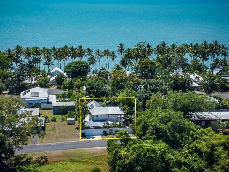 Live just footsteps from the beach at this discounted property.