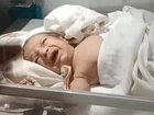 A newborn baby was found abandoned among rocks with a stone stuffed in his mouth and his lips glued shut.