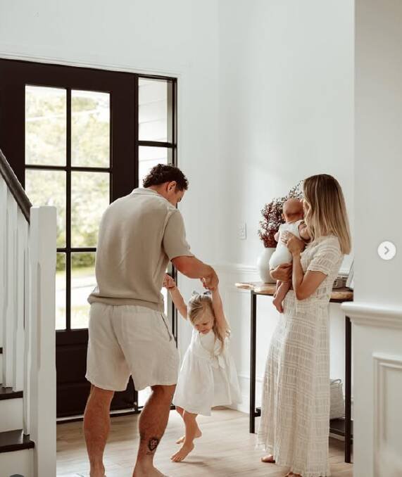 Lachie and Jules Neale at thier new home via @jules_neale Instagram