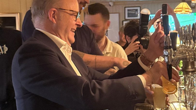 Anthony Albanese has backed up his United Nations address by shouting rounds and pouring beers at a popular Aussie expat pub in New York City.