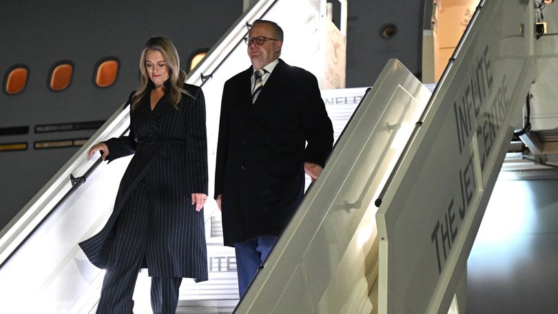 Prime Minister Anthony Albanese and partner Jodie Haydon disembark on arrival at Stansted airport in London.