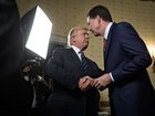 President Donald Trump, left, shakes hands with James Comey, then director of the Federal Bureau of Investigation, in the Blue Room of the White House in 2017. 