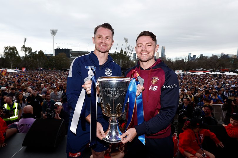 Dangerfield and Neale hold the Premiership Cup during the 2025 Grand Final Parade.