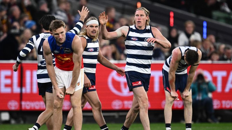 Cat Mark Blicavs (second right) may spend time on Brisbane's Harris Andrews (left) at the MCG.