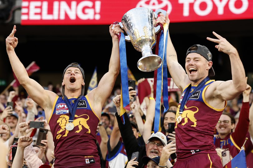 Lachie Neale with Dayne Zorko.