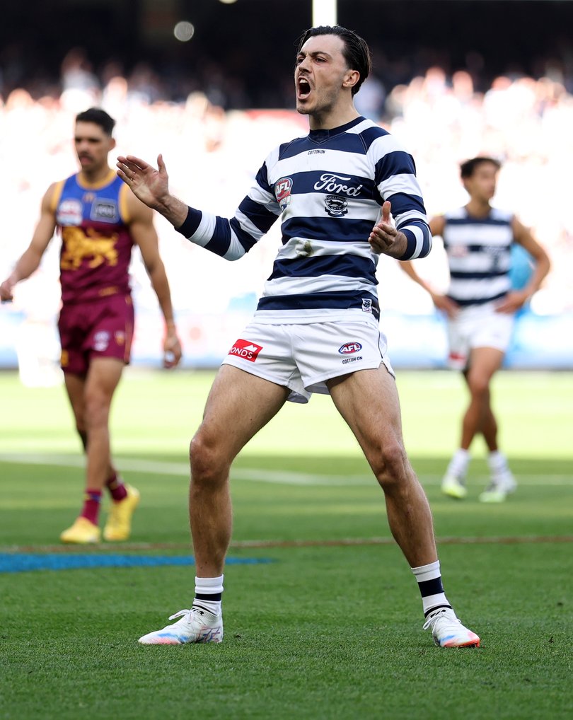 Brad Close of the Cats celebrates after scoring a goal.
