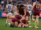 Lions players celebrate.