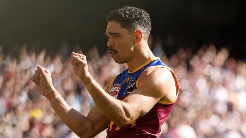 Charlie Cameron of the Lions celebrates a goal.