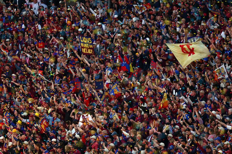 Lions fans celebrate victory.