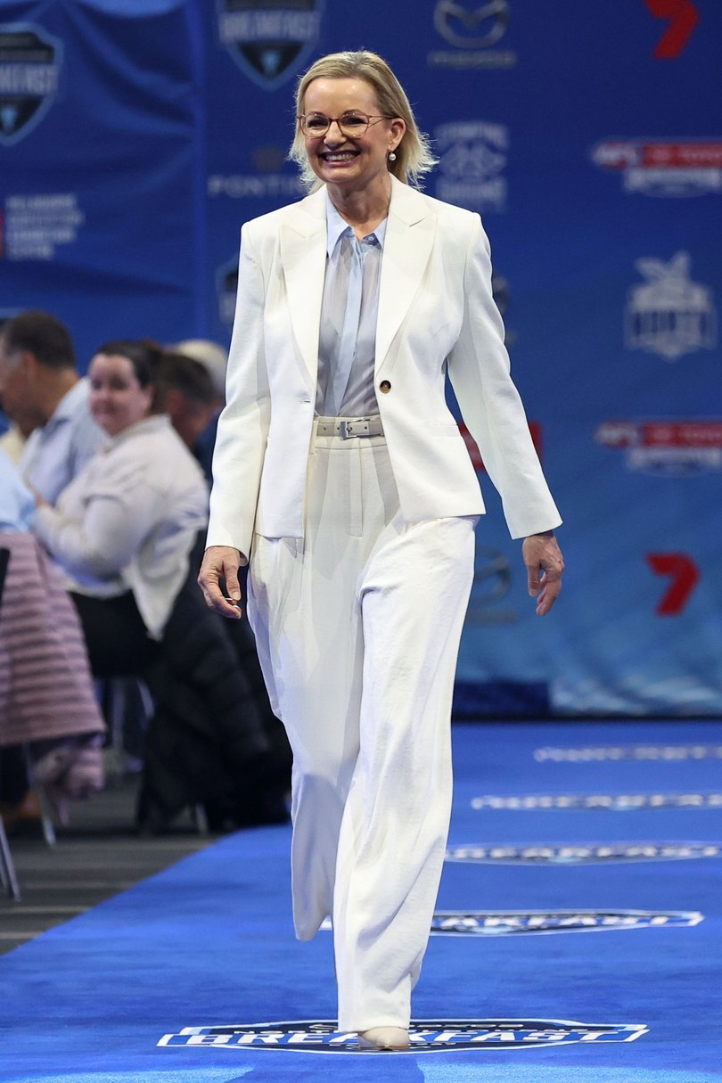 Leader of the Opposition Sussan Ley is introduced during the North Melbourne AFL Grand Final day breakfast.