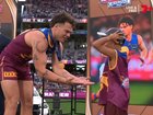 Cam Rayner was presented his medal by a mic’d up Auskick kid. 