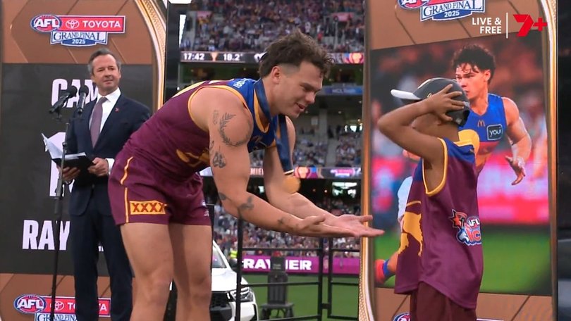 Cam Rayner was presented his medal by a mic’d up Auskick kid. 