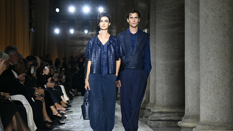 Models walk the runway during the Giorgio Armani collection show at Milan's Fashion Week Womenswear Spring / Summer 2026, at the Pinacoteca di Brera Museum on September 28, 2025 in Milan. (Photo by Stefano RELLANDINI / AFP) STEFANO RELLANDINI
