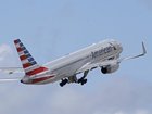 A body has been discovered in the landing gear compartment of an American Airlines plane. 