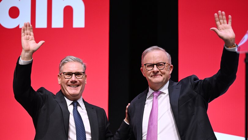 Keir Starmer, UK prime minister, left and Anthony Albanese, Australia's prime minister, wave on the opening day of the UK Labour Party annual conference in Liverpool, UK, on Sunday, September 28, 2025.