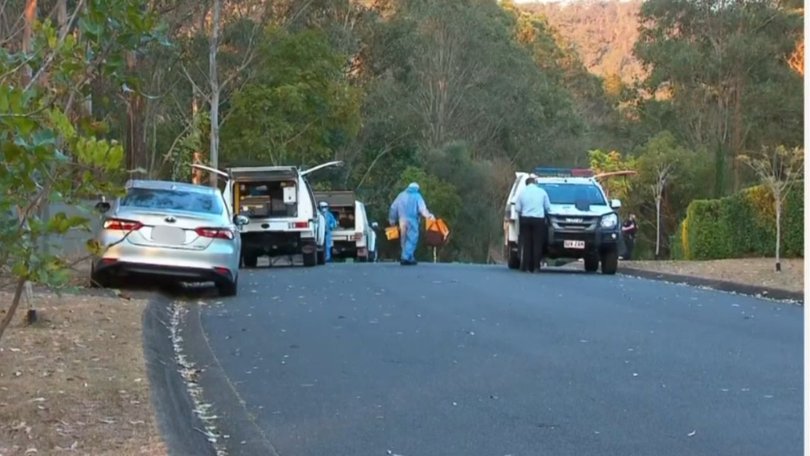 Police and forensic teams remain at a Kenmore Hills home after two bodies were found inside.