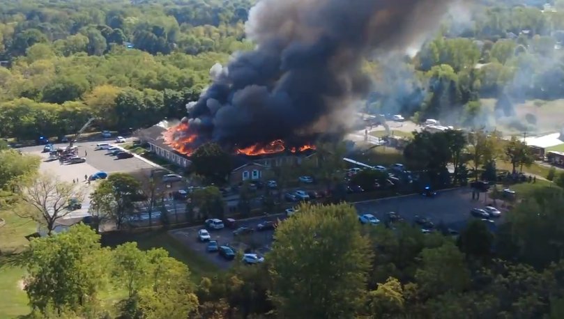 video released by Julie J, @Malkowski6April, Massive flames and smoke rises from The Church of Jesus Christ of Latter-day Saints in Grand Blanc Michigan