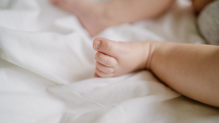 A couple charged over allegedly breaking a four-week-old baby’s leg have been slapped with strict bail conditions. 