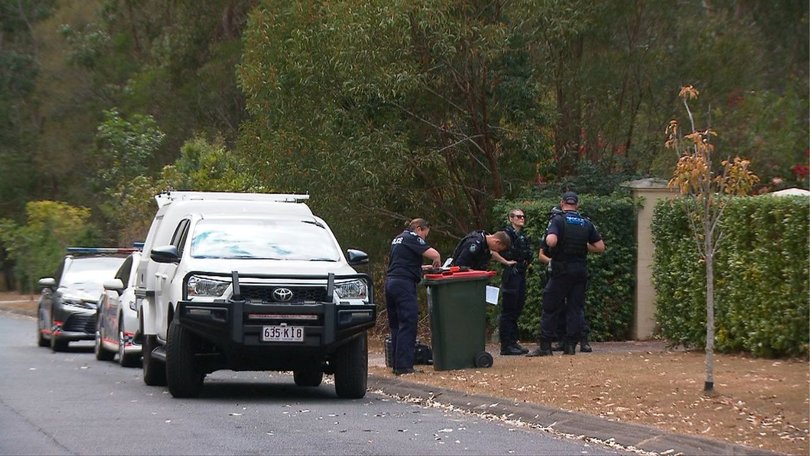 Police at the property on Monday near the bins seen in the woman’s final movements captured on CCTV.