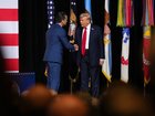 QUANTICO, VIRGINIA - SEPTEMBER 30: U.S. President Donald Trump (R) greets U.S. Secretary of War Pete Hegseth as he arrives to speak to senior military leaders at Marine Corps Base Quantico on September 30, 2025 in Quantico, Virginia. In an unprecedented gathering, almost 800 generals, admirals and their senior enlisted leaders have been ordered into one location from around the world on short notice. (Photo by Andrew Harnik/Getty Images)