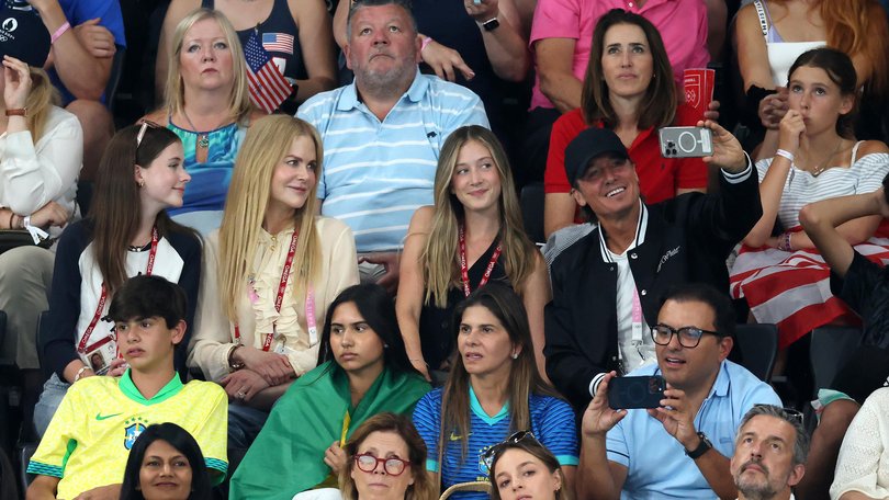 The family takes a selfie at the 2024 Paris Olympics.