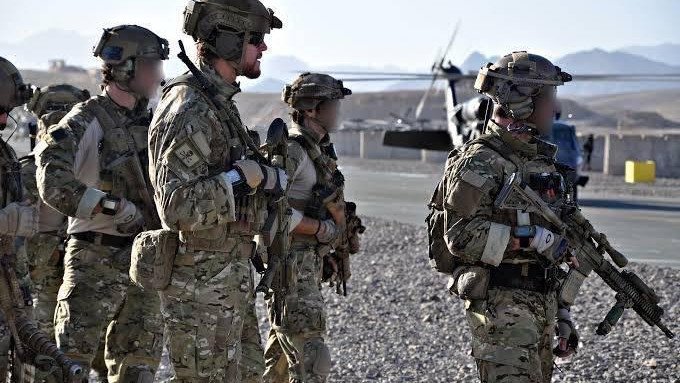 Corporal Ben Roberts-Smith (face unobscured) with his SAS unit, Epic 1, in southern Afghanistan in 2010 before the Battle of Shah Wali Kot, for which he was awarded the Victoria Cross.