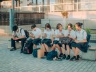 High schoolers in Toyoake, Japan look at their mobile phones on Sept. 29, 2025. Authorities in Toyoake introduced a rule limiting the use of digital devices to two hours per day outside of work and school. (Kentaro Takahashi/The New York Times)