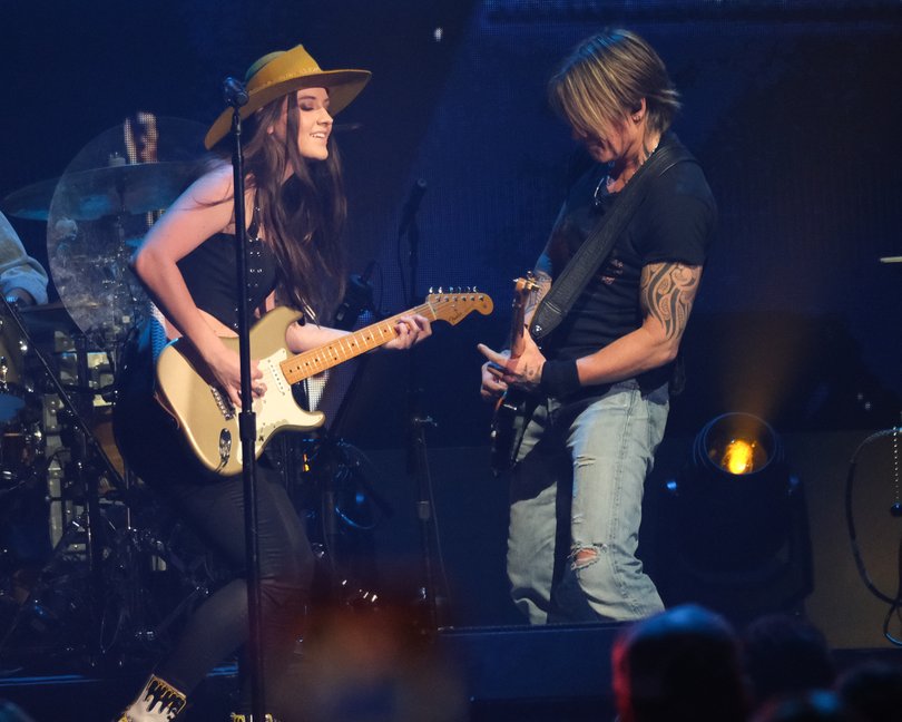 Baugh performing with Urban in 2014.