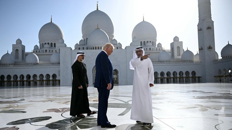 Yousif al-Obaidli, (R) the director-general of the Sheikh Zayed Grand Mosque, accompanies US President Donald Trump on a tour of the mosque in Abu Dhabi on May 15, 2025.