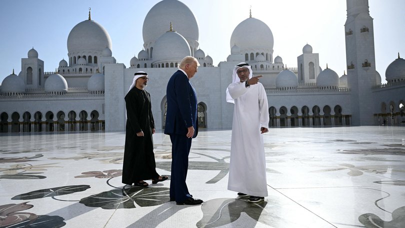 Yousif al-Obaidli, (R) the director-general of the Sheikh Zayed Grand Mosque, accompanies US President Donald Trump on a tour of the mosque in Abu Dhabi on May 15, 2025.