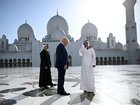 Yousif al-Obaidli, (R) the director-general of the Sheikh Zayed Grand Mosque, accompanies US President Donald Trump on a tour of the mosque in Abu Dhabi on May 15, 2025.