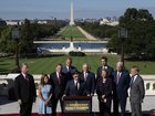 House Speaker Mike Johnson speaks at a news conference with Republican leadership on the first day of a partial government shutdown outside the Capitol.