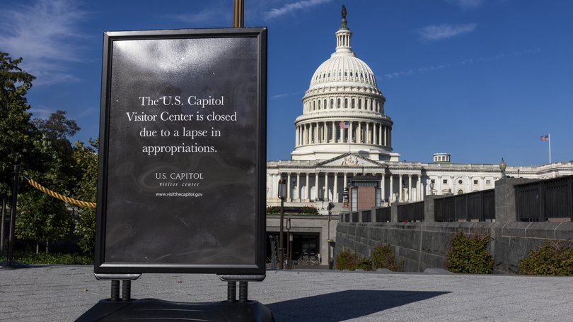 Signage outside the Capitol Hill visitors center notifies the public of its closure due to the government shutdown in Washington.