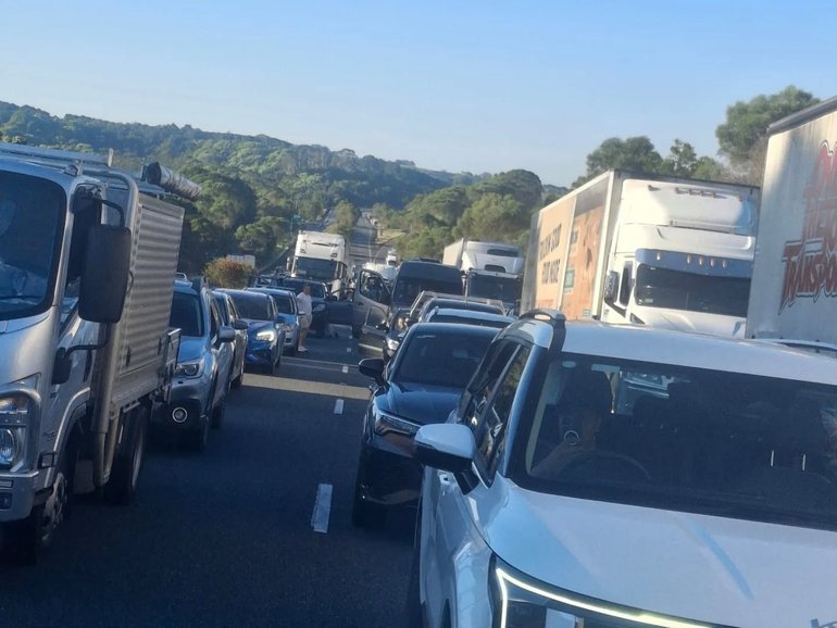 Pacific Highway has been plunged into chaos after several crashes left at least two people dead. 