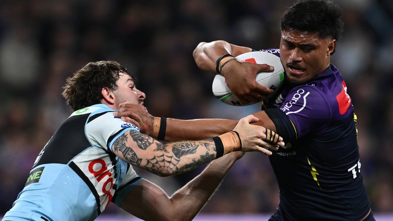 Stefano Utoikamanu charging through the Sharks line.