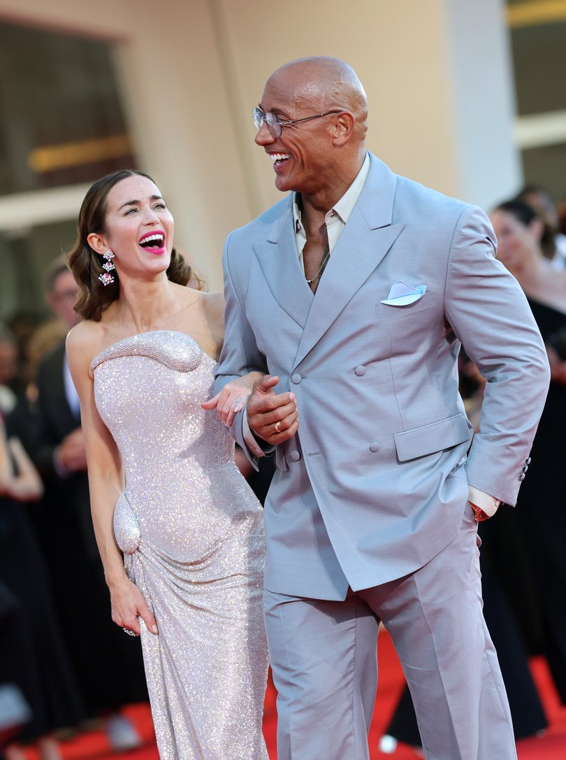Dwayne Johnson and Emily Blunt at the Venice Film Festival promoting The Smashing Machine. 