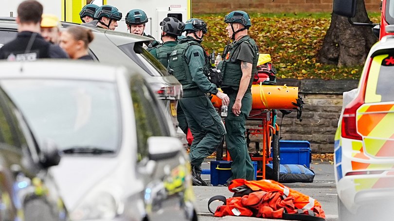 Emergency services at the scene of a terrorist attack at a synagogue in Manchester. 