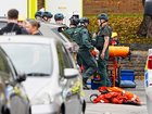 Emergency services at the scene of a terrorist attack at a synagogue in Manchester. 