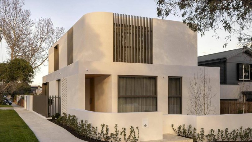 Originally on the 429-square-metre corner block was a single storey mission brown brick home.