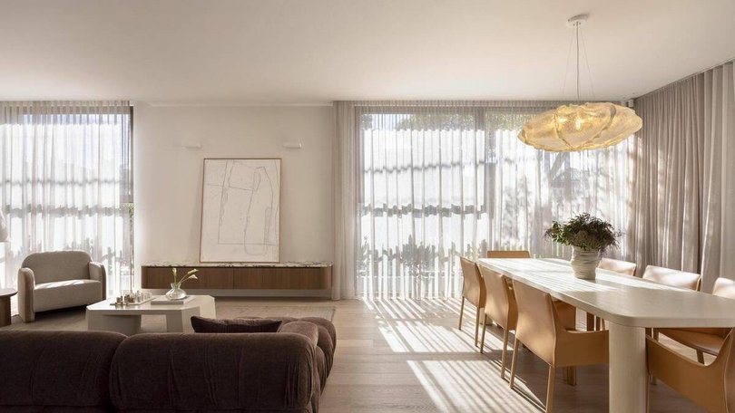 The home is nestled on a peaceful, tree-lined street in Northcote.