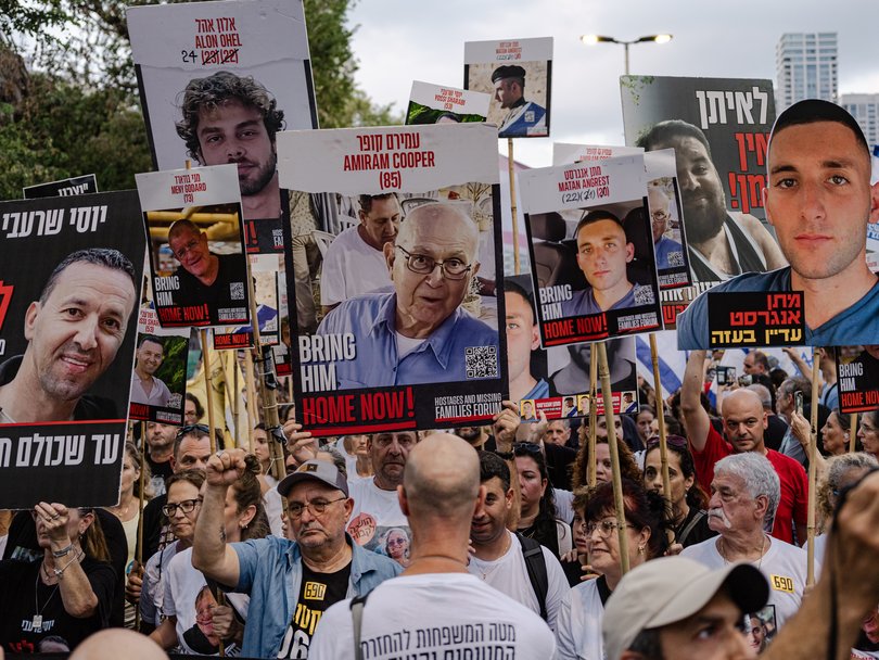 Thousands of protesters, including family members of hostages being held in Gaza, march in Tel Aviv, Israel, Aug. 26, 2025.