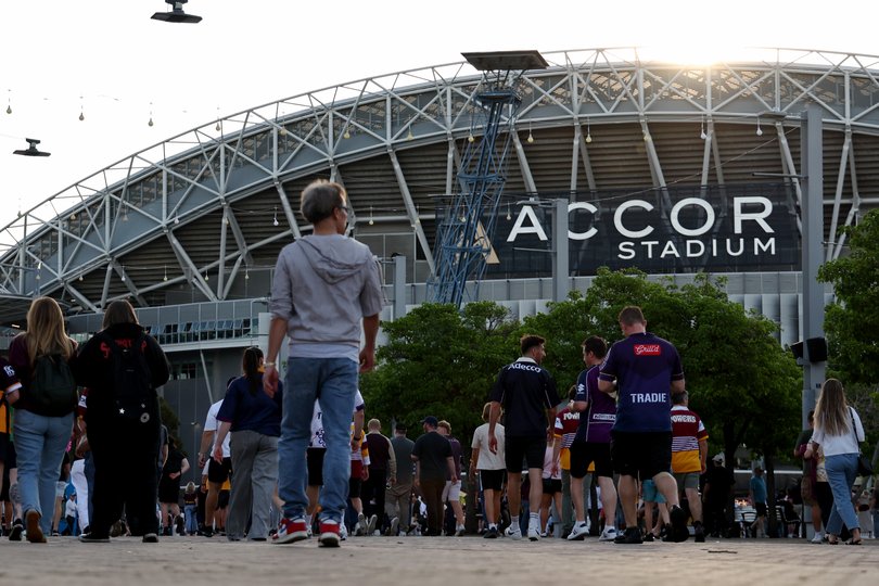SYDNEY, AUSTRALIA - OCTOBER 05: Fans arrive at Accor Stadium ahead of the 2025 NRL Grand Final, on October 05, 2025, in Sydney, Australia. (Photo by Jeremy Ng/Getty Images)